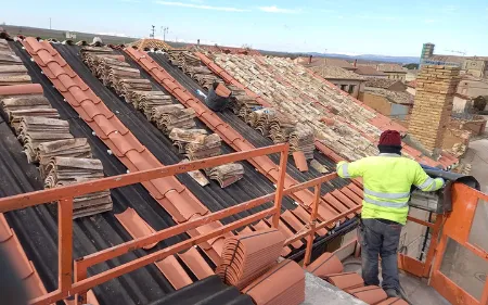impermeabilizar cubierta con onduline bajo teja en comunidad de vecinos en santiago de compostela
